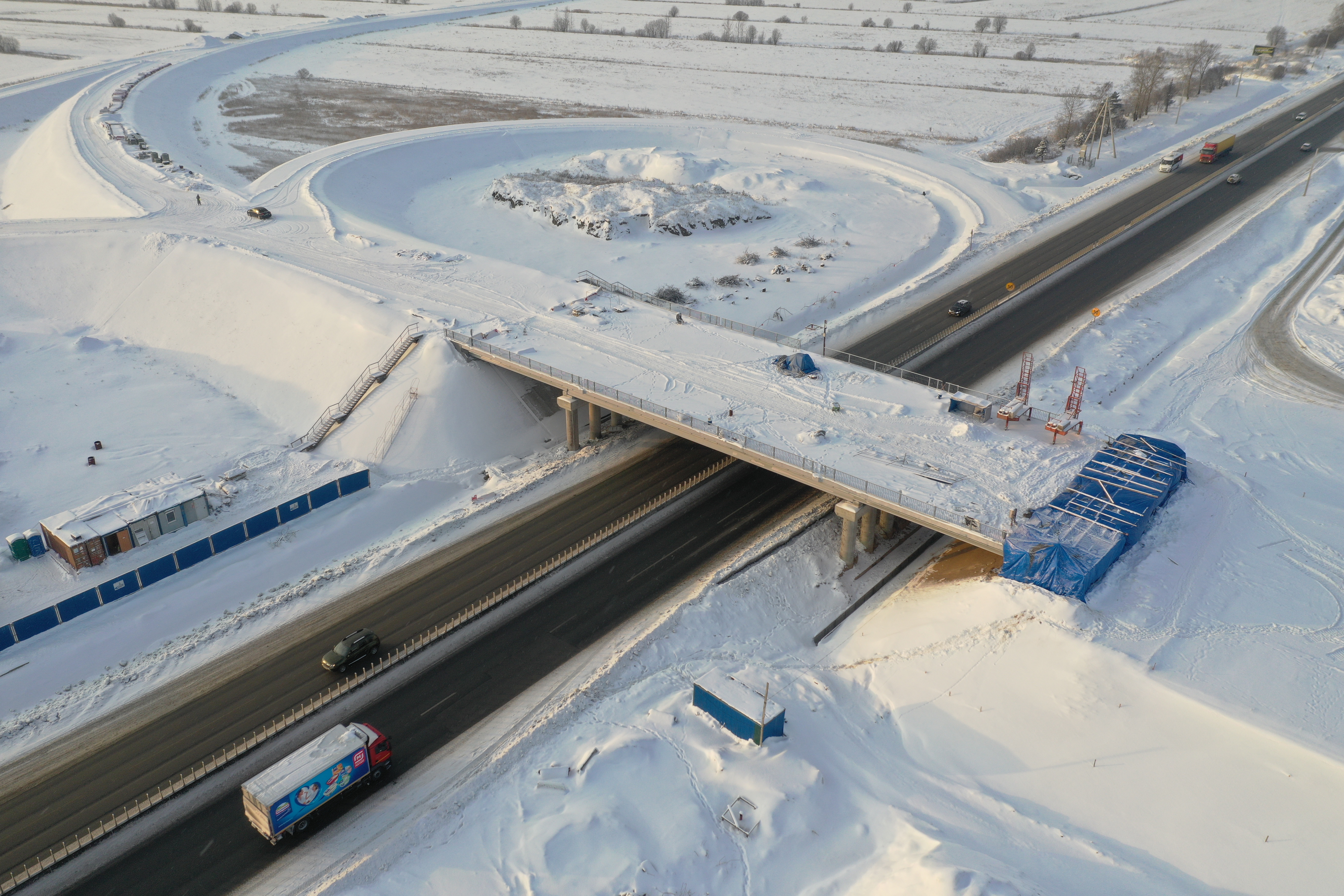 Дорога 10. Реконструкция моста в ям-Ижоре. Реконструкция м10 в ям Ижоре. Мост через Ижору в ям Ижоре. Дорожная развязка.